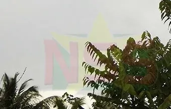 Zon, bewolking en verspreide buien