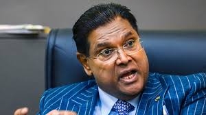 President Santokhi zondagochtend op verkiezingscampagne in Paramaribo.Bron Guus Dubbelman / de Volkskrant President Santokhi zondagochtend op verkiezingscampagne in Paramaribo.Bron Guus Dubbelman / de Volkskrant